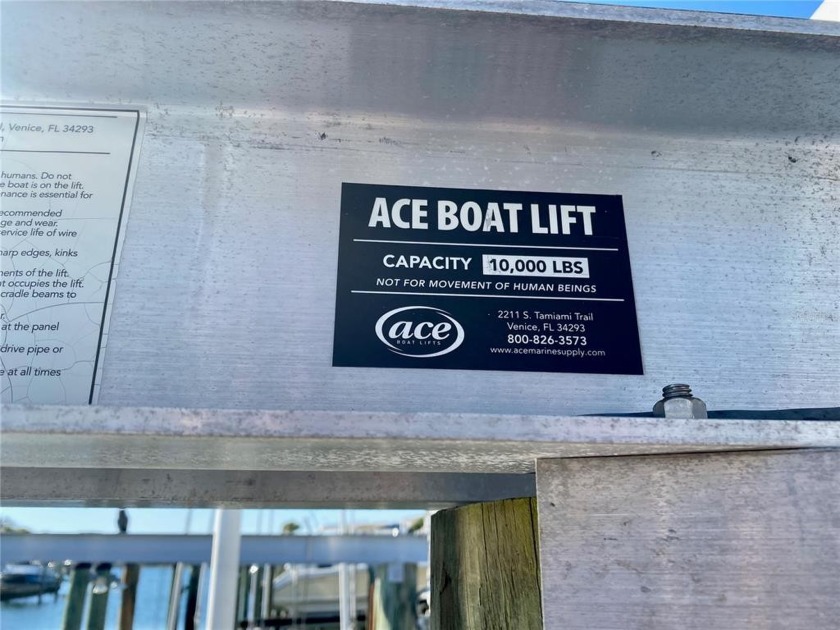 Boat slip with 10,000 lb lift available for sale!  Must own a - photo 3
