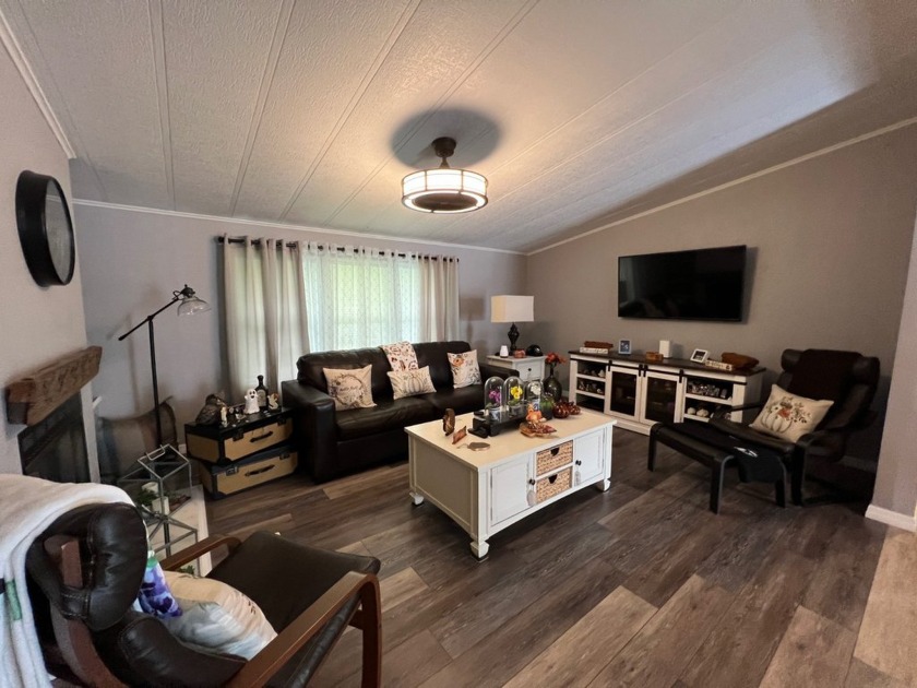 Stunning home located in Reflections on Silver Lake 55+ - photo 3