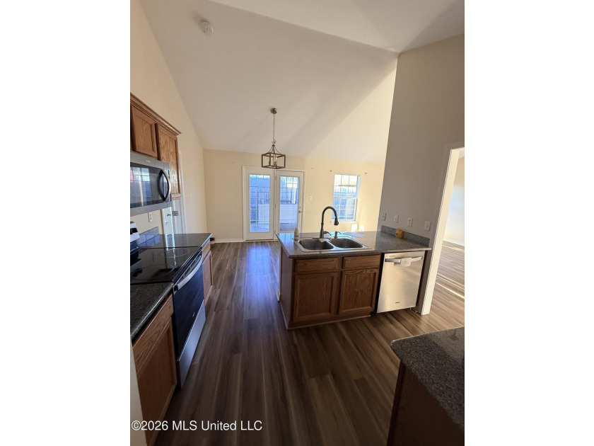 Super cute and super clean! This charming home sits on a large - photo 6