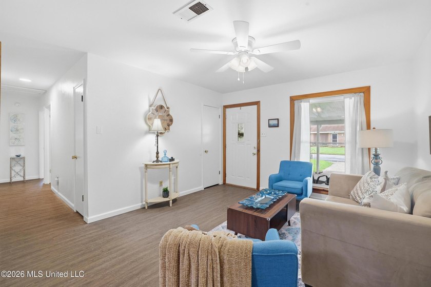 Welcome home to this surprisingly spacious 4 bedroom, 2 bath - photo 5