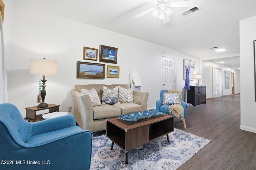 Welcome home to this surprisingly spacious 4 bedroom, 2 bath - photo 6