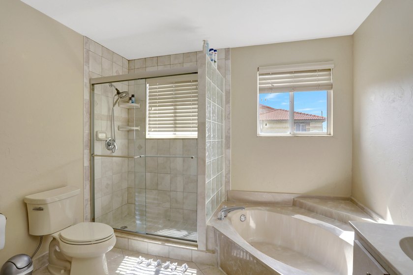 This Cortina home in the non-mandatory Boca Pointe Country Club - photo 11