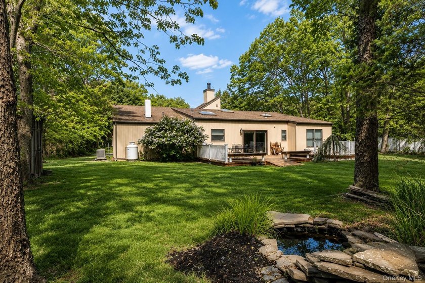 Located on a cul-de-sac in desirable Mount Sinai, this charming - photo 16
