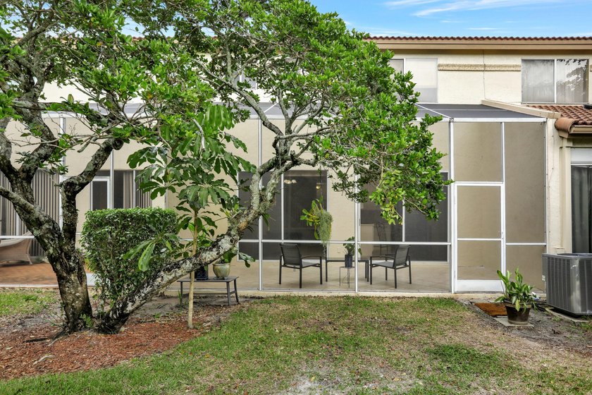 This Cortina home in the non-mandatory Boca Pointe Country Club - photo 17