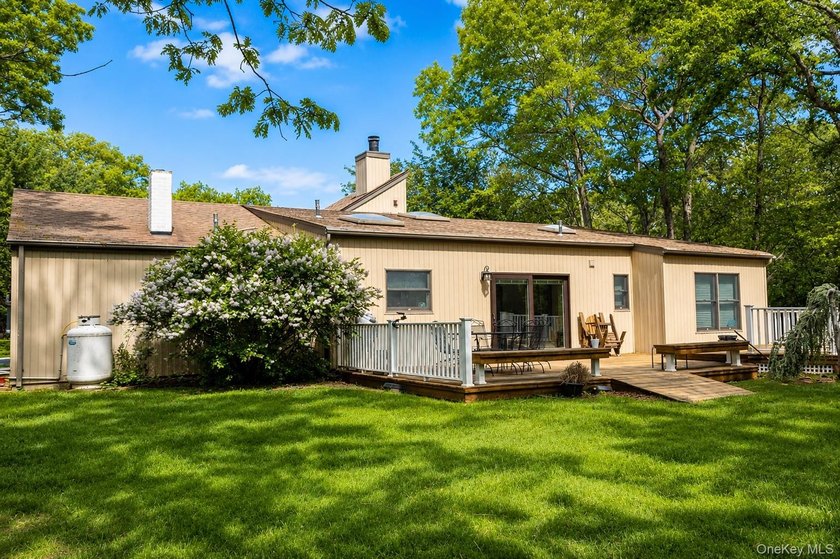 Located on a cul-de-sac in desirable Mount Sinai, this charming - photo 18