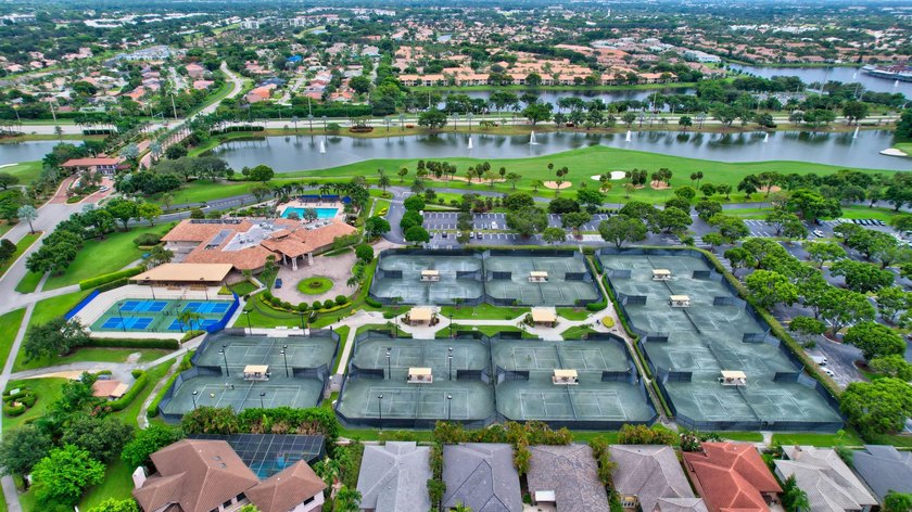 This Cortina home in the non-mandatory Boca Pointe Country Club - photo 25
