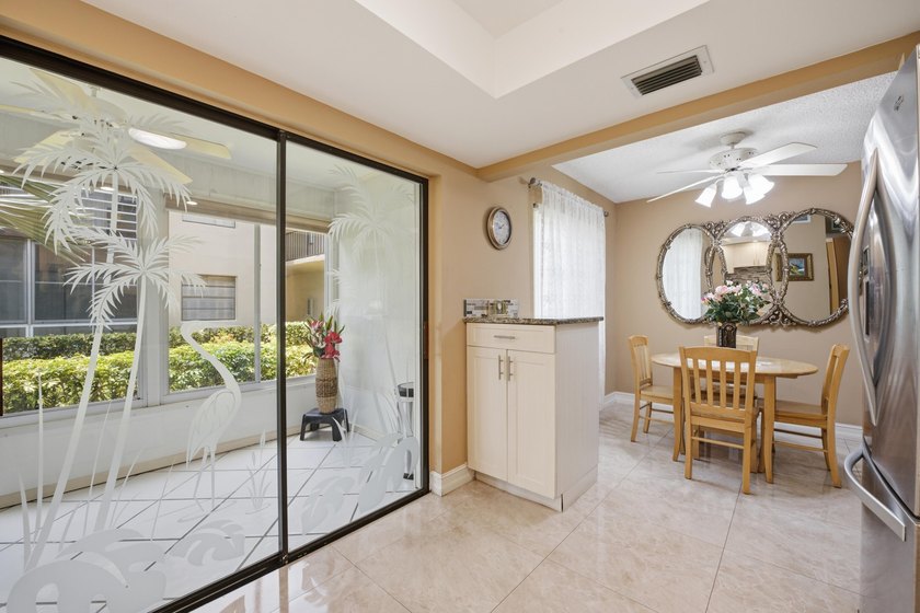 Beautifully updated first-floor condominium offering the perfect - photo 5
