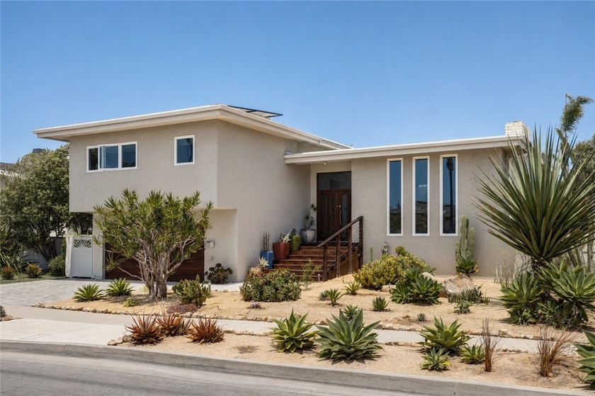 Situated in the coveted Huntington Harbour community, this - photo 2