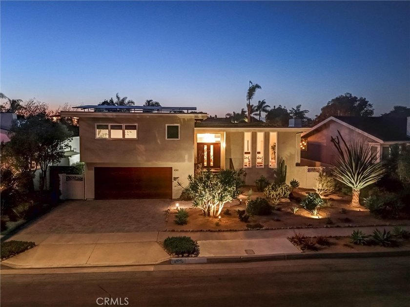 Situated in the coveted Huntington Harbour community, this - photo 3