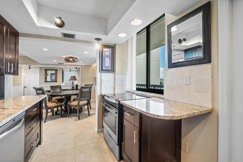 This turn key spacious 3 bedroom 3 bath top floor end unit is - photo 9