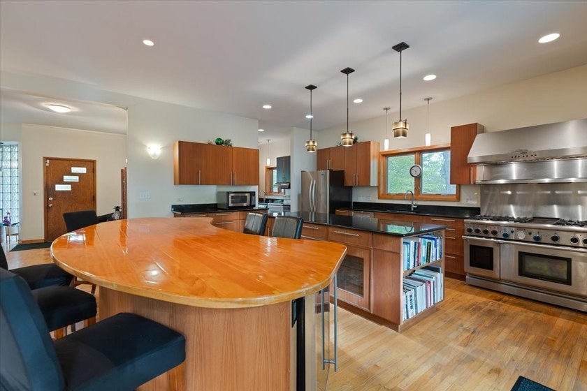 Expanded and renovated in 2008, this two-story prairie-style - photo 12