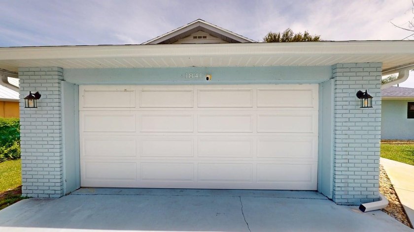 Welcome to this charming single-story residence located in Port - photo 5