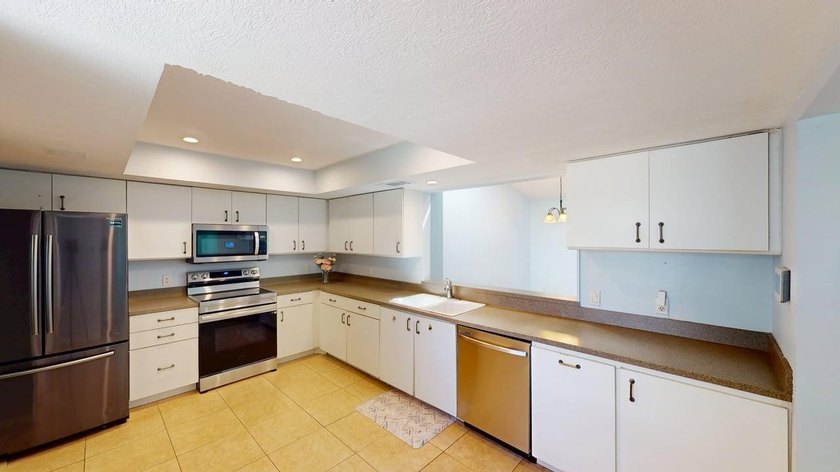 Welcome to this charming single-story residence located in Port - photo 10
