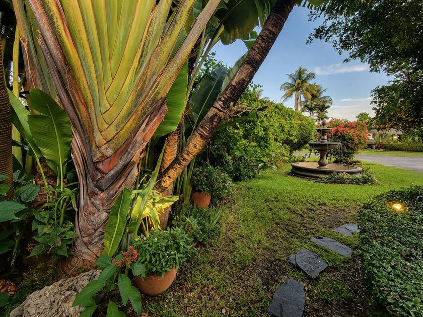 Welcome to this one-of-a-kind tropical retreat in the highly - photo 8
