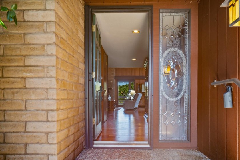 Discover a rare standalone residence within The Bluffs, a gated - photo 3