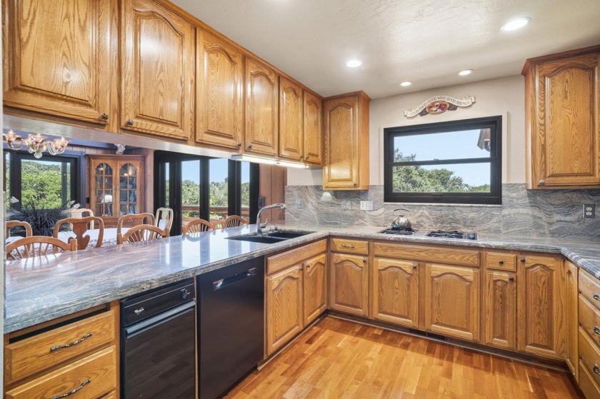 Discover a rare standalone residence within The Bluffs, a gated - photo 9