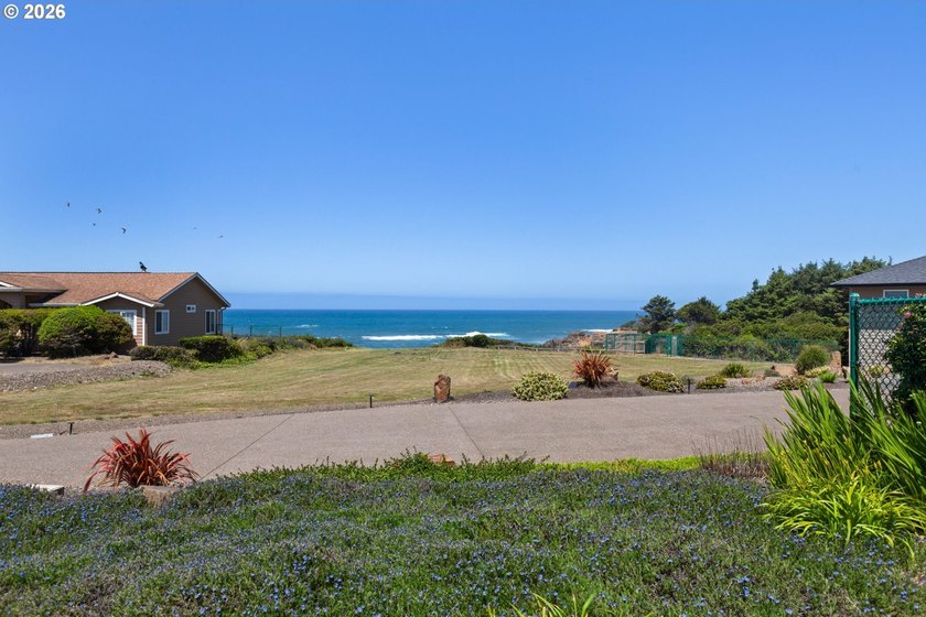 Located steps from the ocean in Fishing Rock's gate guarded - photo 3