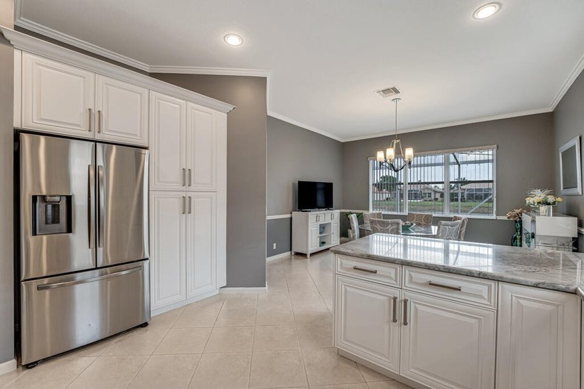 Welcome to this exceptional 3 bedroom, 3-bathroom plus - photo 4