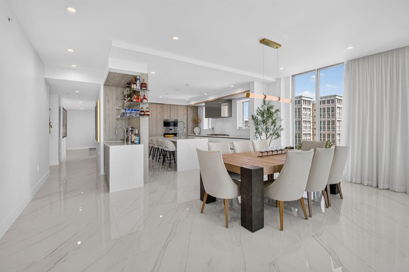 Discover Residence 601 - a rare corner residence in Royal Palm's - photo 7