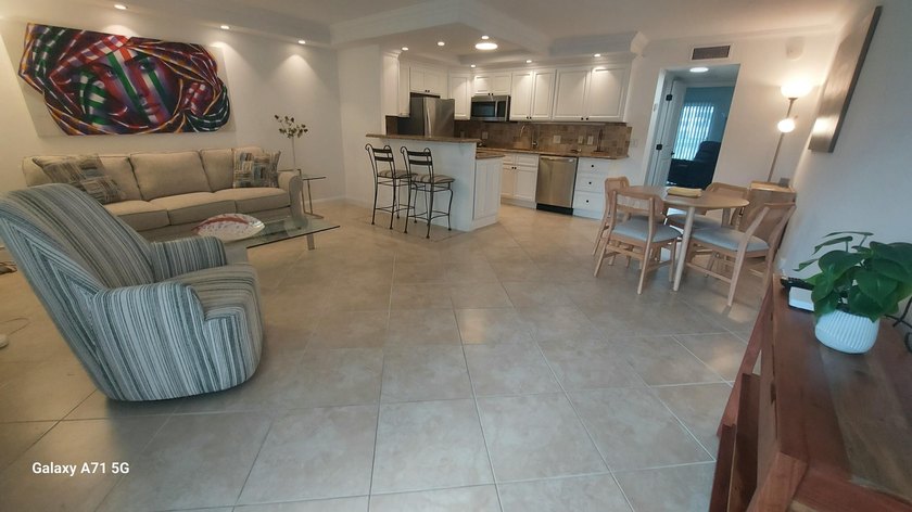 STUNNING RENOVATED! FIRST FLOOR WATERVIEW! Sparkling! Newly - photo 13