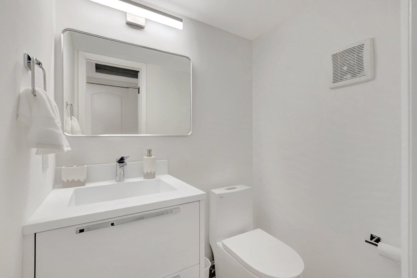 STUNNING RENOVATED! FIRST FLOOR WATERVIEW! Sparkling! Newly - photo 14
