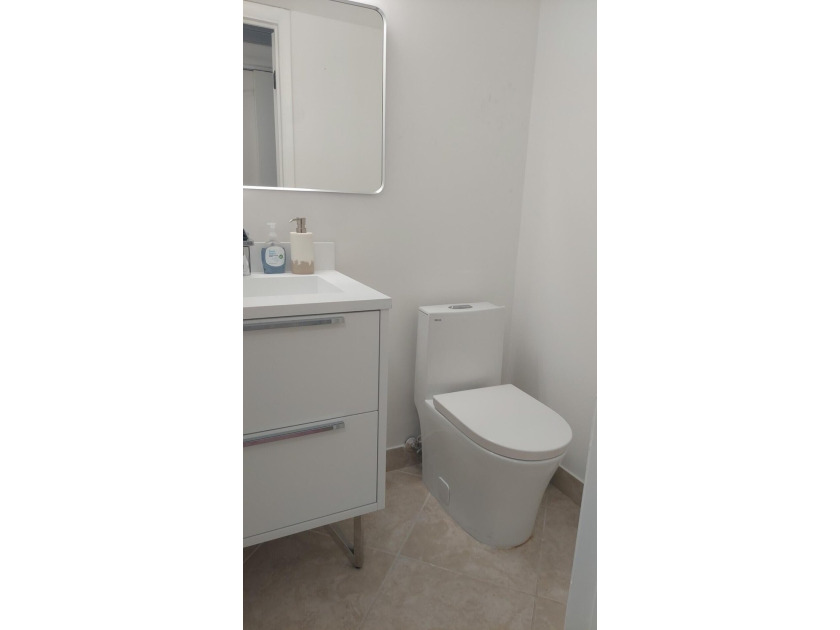STUNNING RENOVATED! FIRST FLOOR WATERVIEW! Sparkling! Newly - photo 15