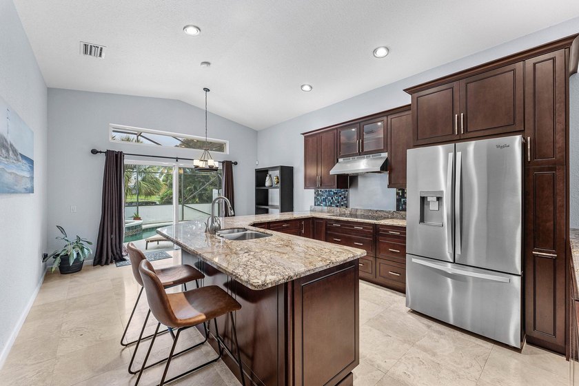 Welcome to this beautifully upgraded waterfront home in the - photo 5