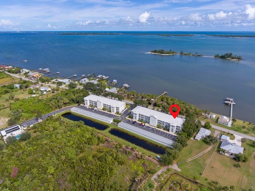 FIRST FLOOR! Enjoy beautiful Indian River Lagoon views from this - photo 3