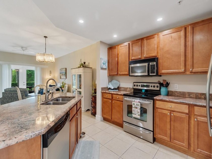 FIRST FLOOR! Enjoy beautiful Indian River Lagoon views from this - photo 10