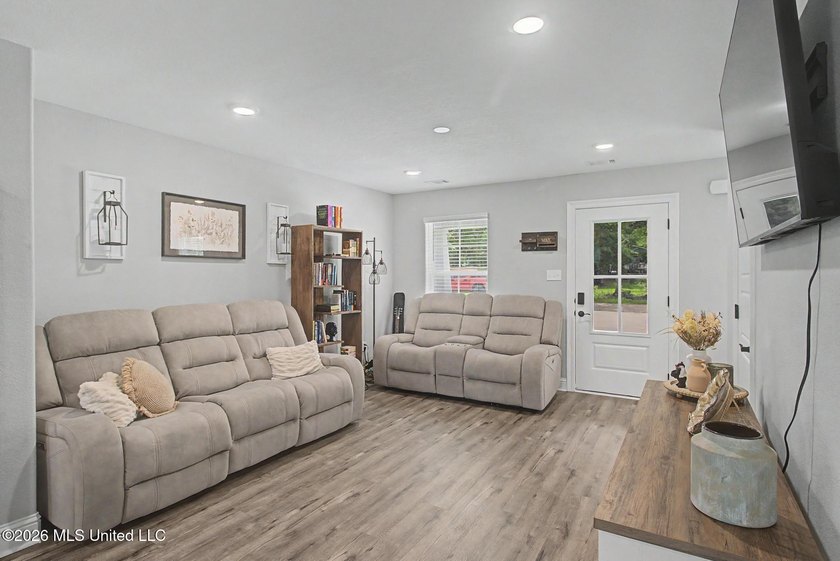 Welcome home to this beautifully crafted 2024 residence that - photo 3