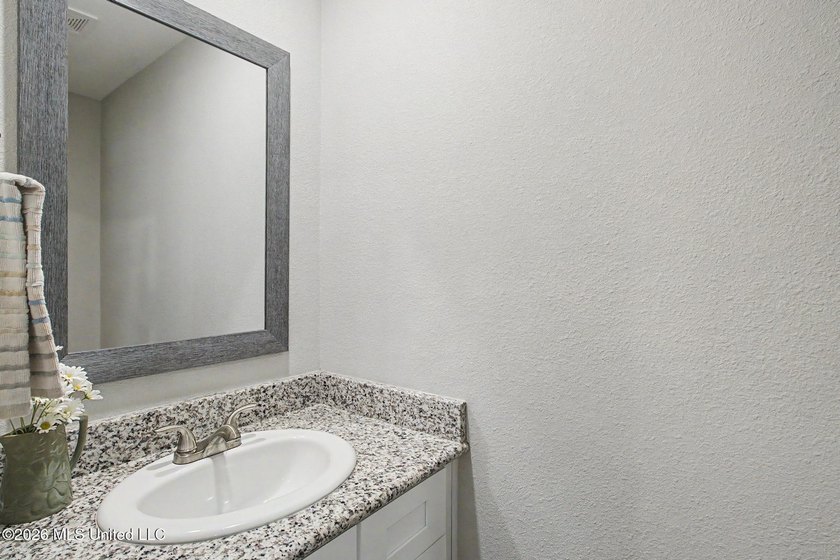 Welcome home to this beautifully crafted 2024 residence that - photo 6