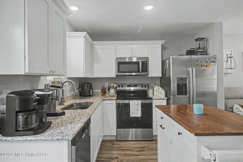 Welcome home to this beautifully crafted 2024 residence that - photo 8