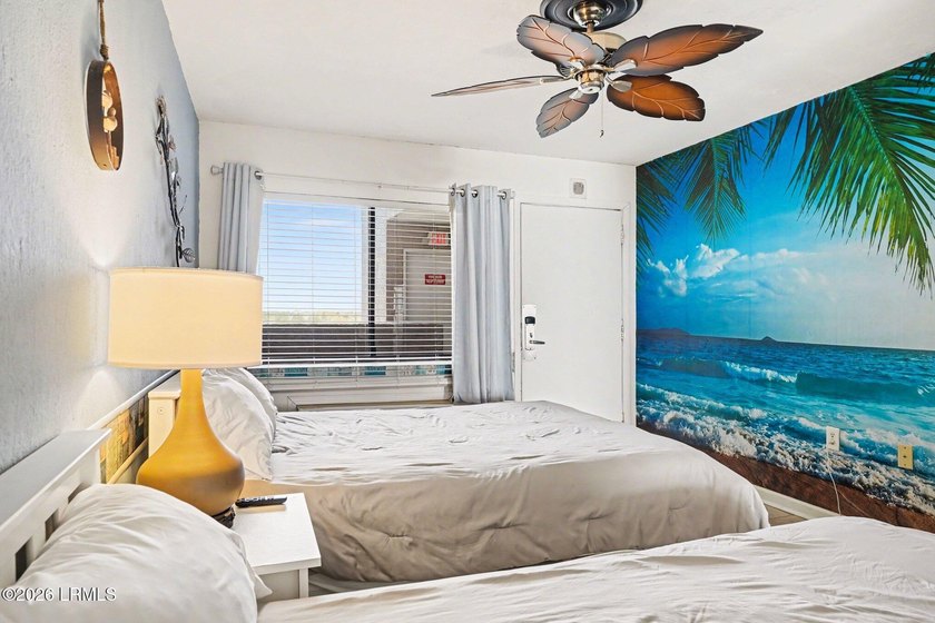 Wake up to breathtaking ocean views in this beautifully - photo 14