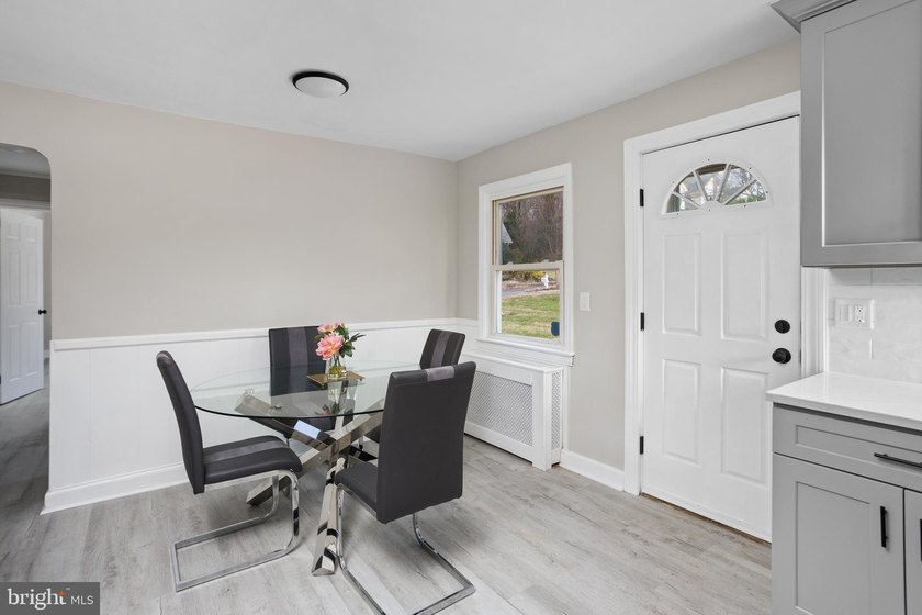 Welcome home to this beautifully renovated expanded Cape Cod - photo 16