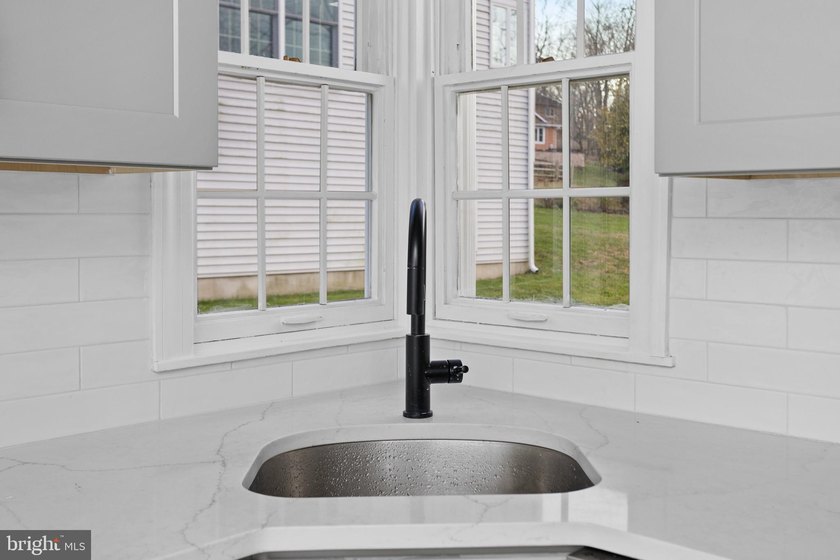 Welcome home to this beautifully renovated expanded Cape Cod - photo 17