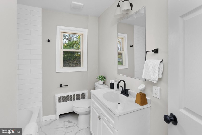 Welcome home to this beautifully renovated expanded Cape Cod - photo 20