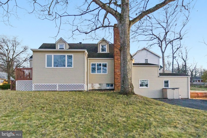 Welcome home to this beautifully renovated expanded Cape Cod - photo 34