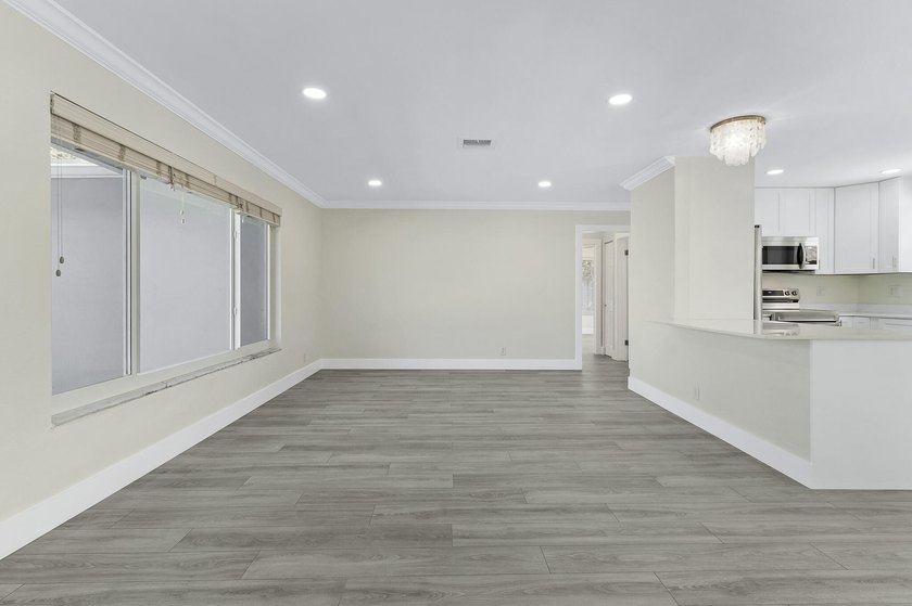 Completely updated and move-in ready, this 3-bedroom, 2-bath - photo 7