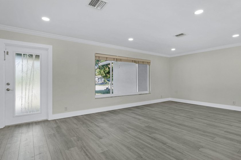 Completely updated and move-in ready, this 3-bedroom, 2-bath - photo 8