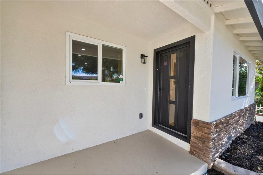 Welcome home to this beautifully remodeled 4BD/2BA residence - photo 2