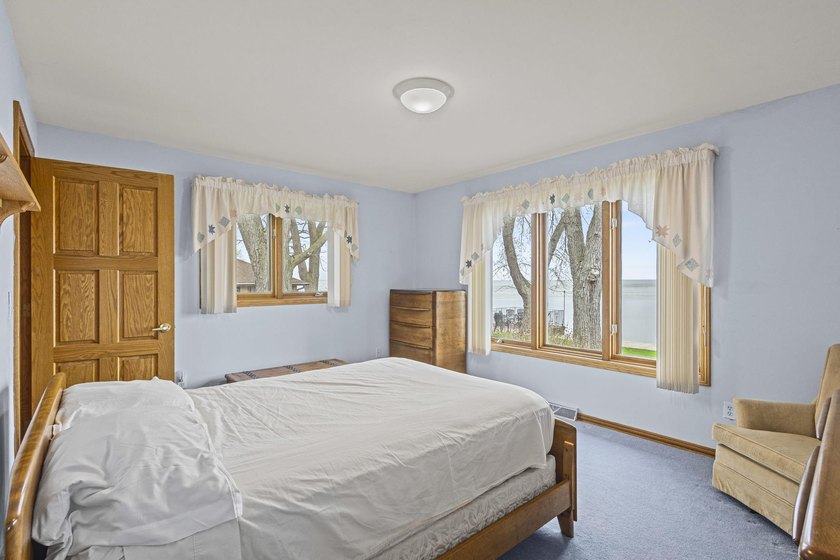 Premier bayfront property on Sunset Shores! Enjoy breathtaking - photo 19