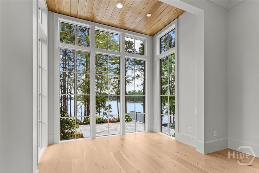 WELCOME TO THE PINNACLE OF LAKESIDE LUXURY, NESTLED WITHIN THE - photo 42