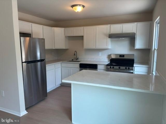 Don't miss this one completely redone with upgraded LVP flooring - photo 3