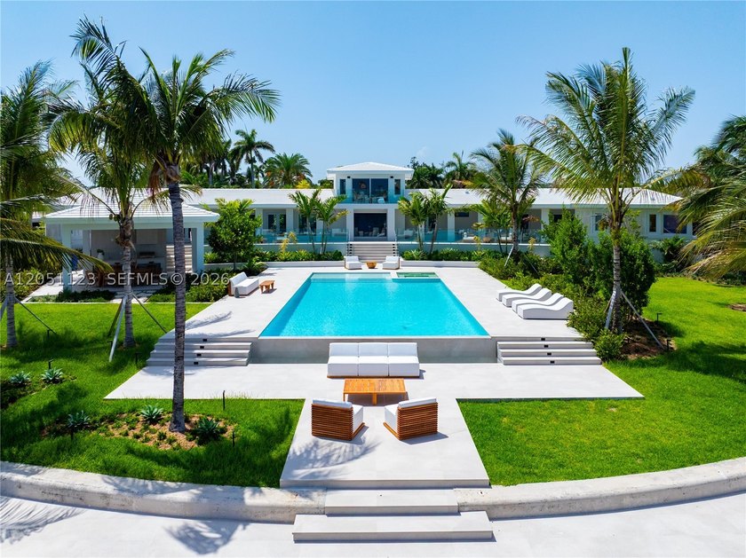 Spectacularly remodeled, unique corner estate situated on nearly - photo 3