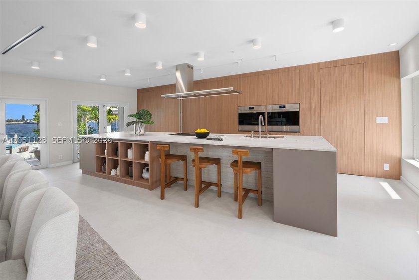 Spectacularly remodeled, unique corner estate situated on nearly - photo 6