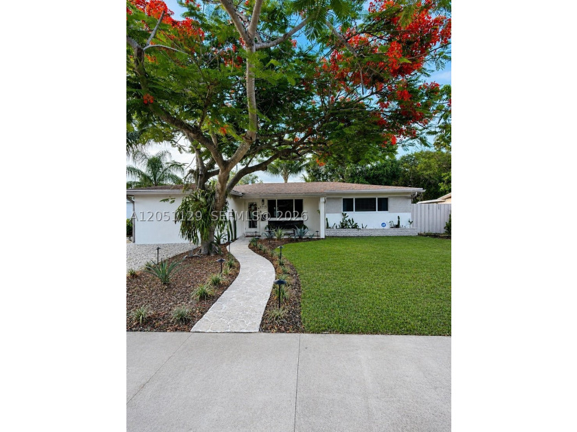 Completely remodeled with a designer's eye, this beautiful home - photo 3