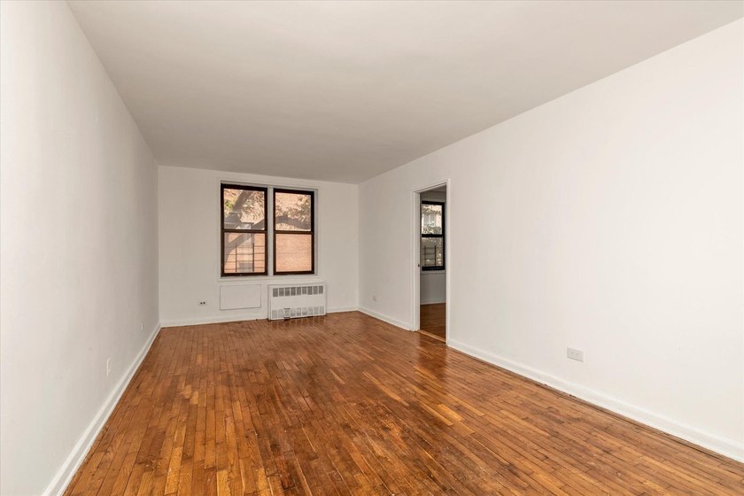 Welcome to this oversized junior four co-op located in the heart - photo 4
