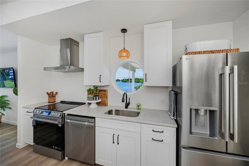 Experience the ultimate in SERENE saltwater lake living with one - photo 15