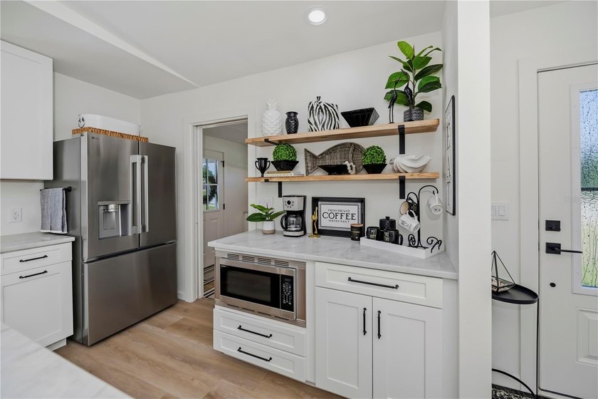 Experience the ultimate in SERENE saltwater lake living with one - photo 16