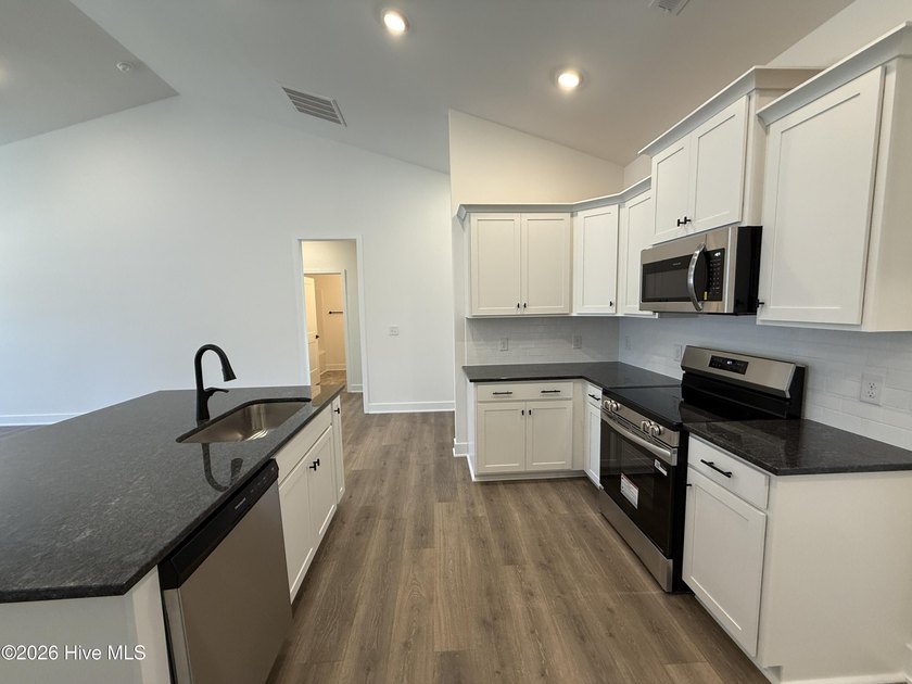 Welcome to Wood Creek Landing in Leland! THIS HOME WAS JUST - photo 10
